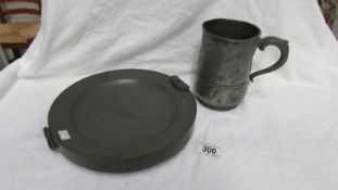 A pewter hot water plate,
