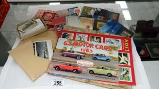 A mixed lot including cigarette cards,