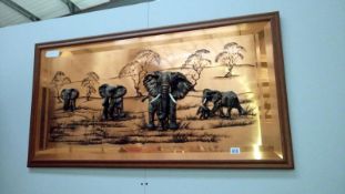 A large copper wall picture with relief Elephants
