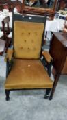 A large Edwardian Grandfather chair