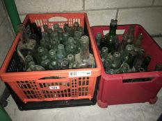 2 boxes of small clear bottles (Approximately 40)