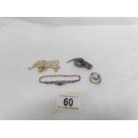 A silver marcasite brooch, a yellow metal stone set leopard brooch,