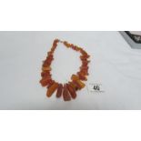 A large natural yellow amber necklac