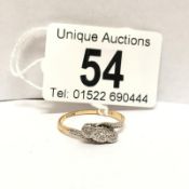 An 18ct gold 3 stone diamond ring