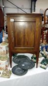 A mahogany inlaid pot cupboard