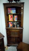 An oak corner cupboard