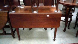 A Victorian mahogany pembroke table