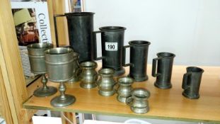 2 sets of pewter measures and 2 pewter goblets