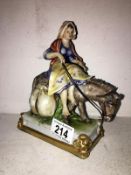 An old Capodimonte lady on donkey