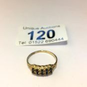 A 10 stone square 9ct gold ring