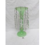 A green glass lustre with crystal droppers