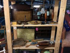 Two shelves of wooden items
