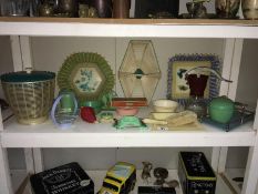 A shelf of 1950s retro table and kitchen ware