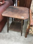 A 1930s oak two tiered side table