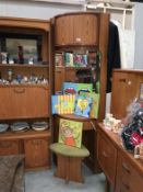 A retro teak effect corner wall unit