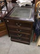 A dark wood leather topped 2 draw filing cabinet