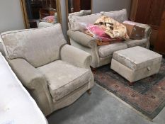 A 2 piece suite with foot stool