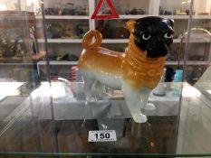 A Victorian Staffordshire pug dog