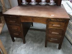 An oak double pedestal desk