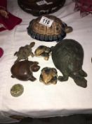 A quantity of tortoise/turtle ornaments