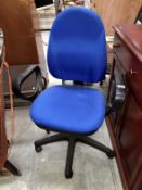 A blue fabric office chair