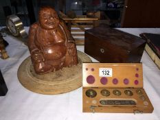 A set of small weights & wooden Buddha etc.