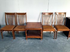 4 ladder back chairs and a table