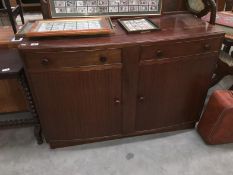 A darkwood stained 2 drawer 2 door sideboard