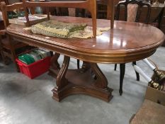 A good quality heavy darkwood cross banded dining table with string inlay