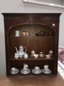 A darkwood stained bookcase