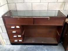 A haberdashery display cabinet with drawers