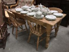 A Victorian pine scrub top table and 4 later chairs