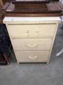 A 3 drawer painted chest full of tools