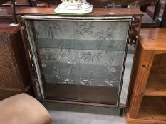 A retro display cabinet with marble effect decoration