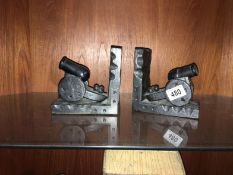 A pair of Black Forest style cannon bookends