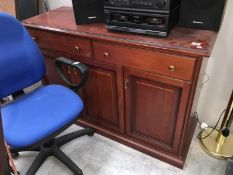 A dark wood stained 2 over 3 sideboard