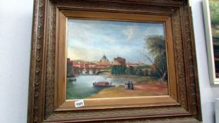 A gilt framed oil on canvas city scape