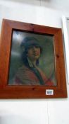 A pine framed print of a red Indian squaw