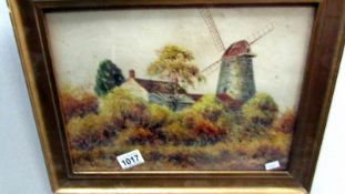 A framed and glazed watercolour of an English Windmill signed A lines, image 34 x 25 cm