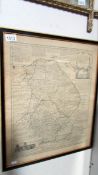 A framed and glazed antique map of Lincolnshire, 45 x 55cm