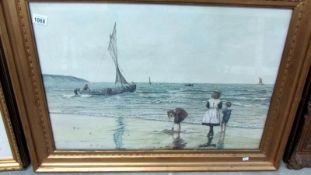 A framed and glazed seascape print 'On the Sands', Roderick Lovesey, image 75 x 50cm