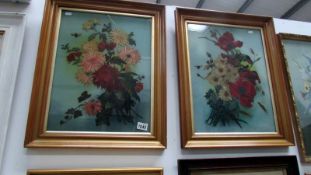 A pair of framed and glazed floral collages