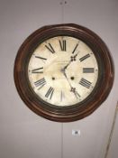 A 19th century mahogany Fred Laycock cleck heaton round wall clock by the Ingram Co USA.