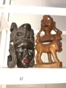 A carved African mask & carved bust