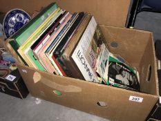 A box of records and LPs