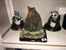 2 giant panda figures & brown bear with cubs