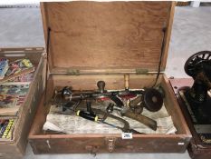 A wooden tool box & contents