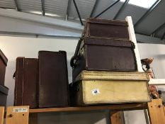 5 leather suitcases