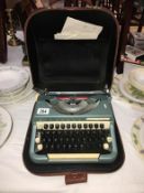 A cased Imperial Companion type writer