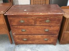 A Victorian 2 over 2 pine chest of drawers